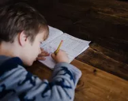 Child doing maths pic by Annie Spratt