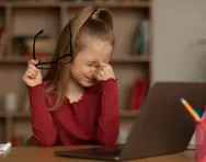 Girl struggling with vision