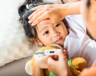 Child having temperature check