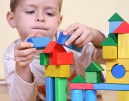 Boy building with blocks