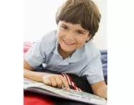Boy reading comic book