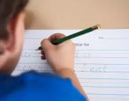 Child practising handwriting