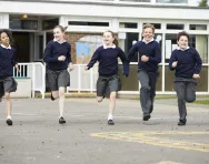 Children running in the playground