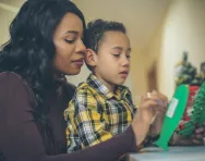 Mother and child practising maths skills