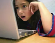 Girl engrossed in her computer