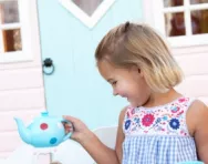 Girl playing tea parties