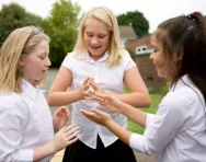 Friends playing together in playground