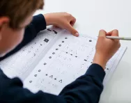 Boy practising non-verbal reasoning