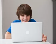 Boy looking at computer