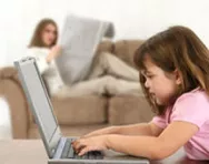 Little girl using laptop