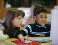 Little girls at computer