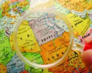 Magnifying glass over map