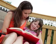 Mother and daughter reading