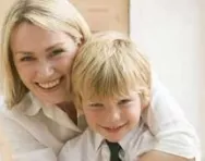 Happy mum and son hugging