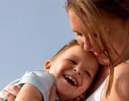 Mum hugging son