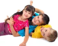 Children playing 'pile on'