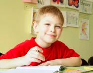 Child writing at home