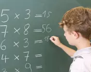 boy doing multiplication