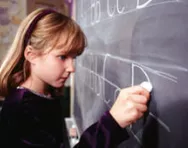 Girl practising writing