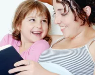 Mum and child reading together