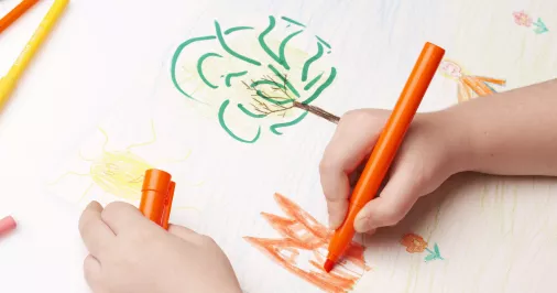 reception child drawing a picture