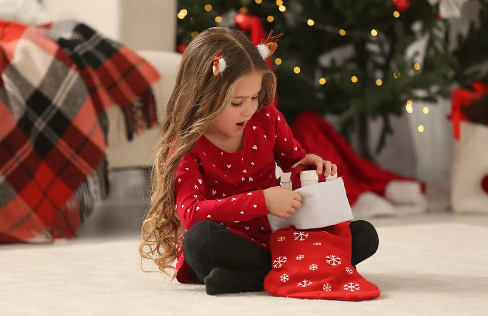 Girl with Christmas stocking