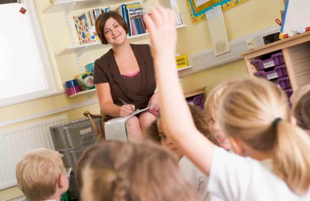 Teacher and children